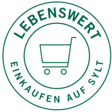 Grünes rundes Logo mit Einkaufswagen und Schriftzug „Lebenswert einkaufen auf Sylt“