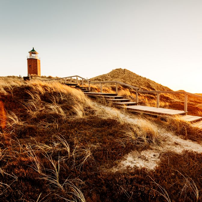 Sonnenuntergang über den Dünen von Kampen beim Quermarkenfeuer